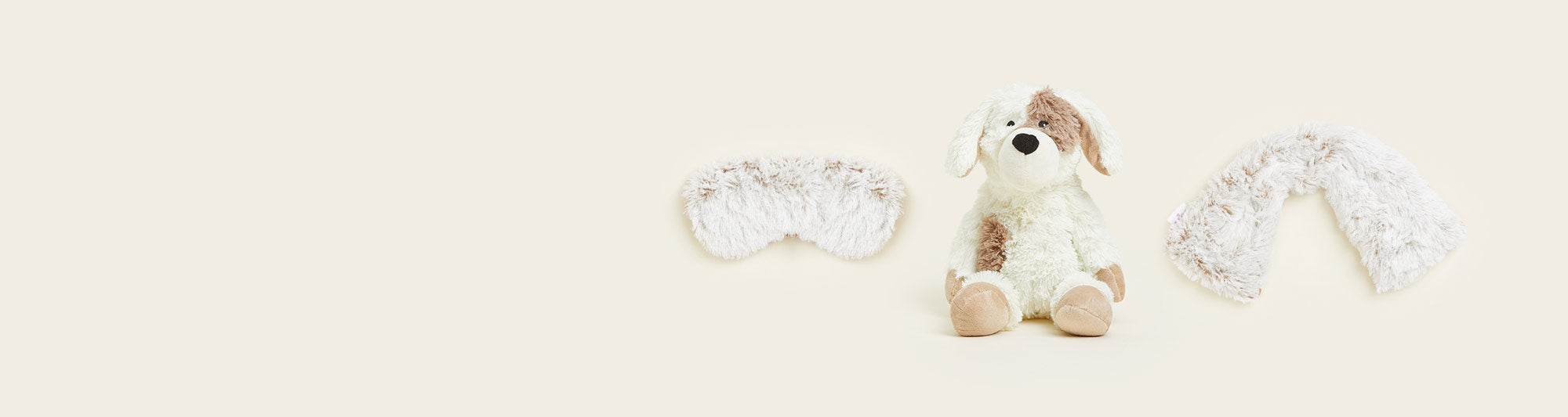 Marshamllow Brown Eye Mask, Puppy Warmies, Marshamllow Brown Neck Wrap lined up in a row