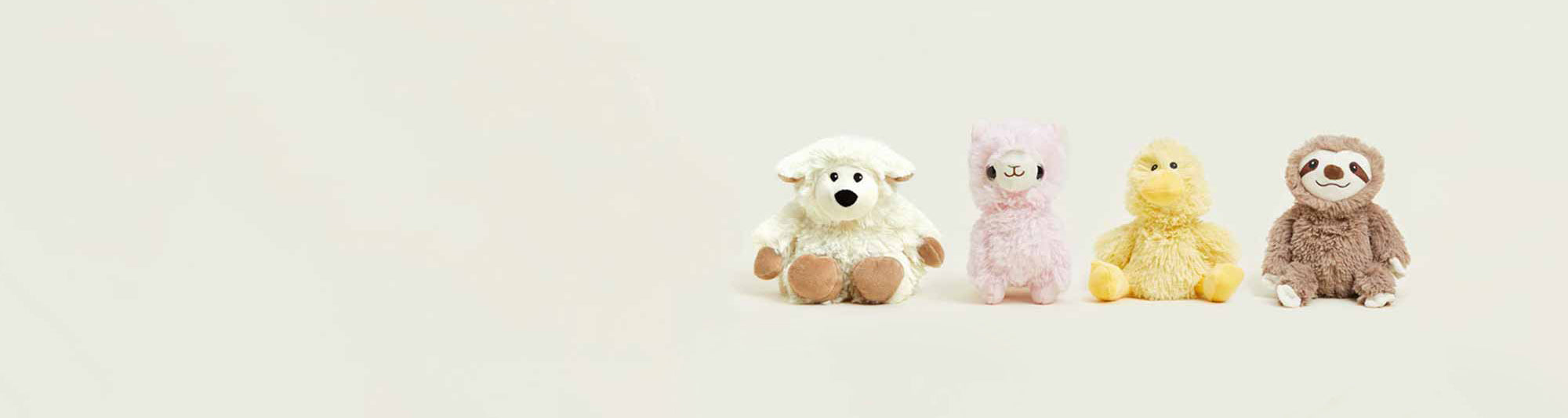 Boy hugging Warmies Turtle