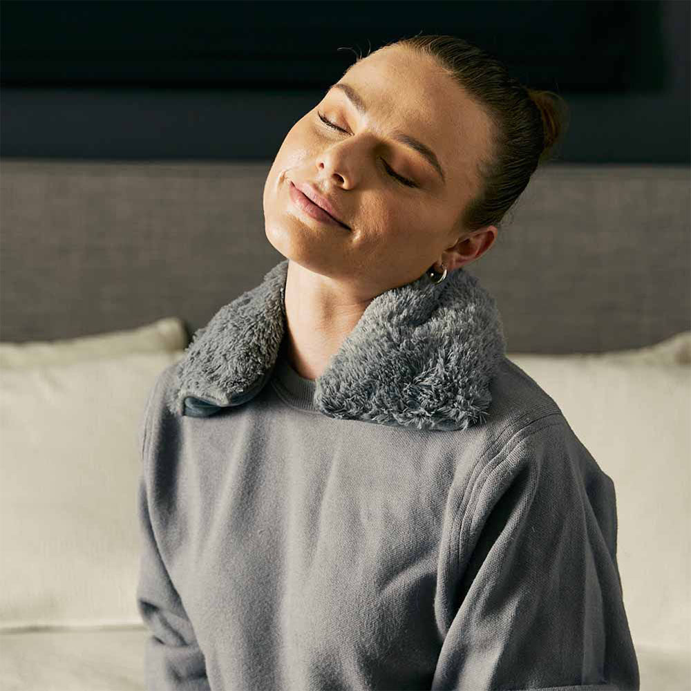 woman wearing warmies gray neck wrap