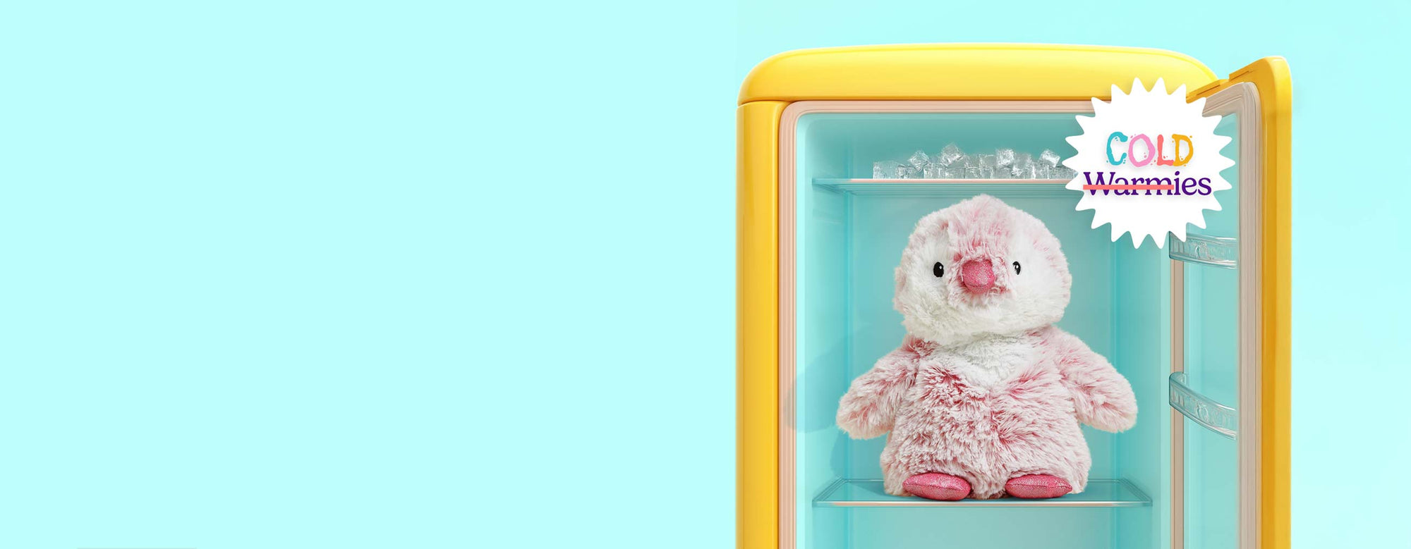 Pink penguin Warmies sitting in a yellow cooler with ice.