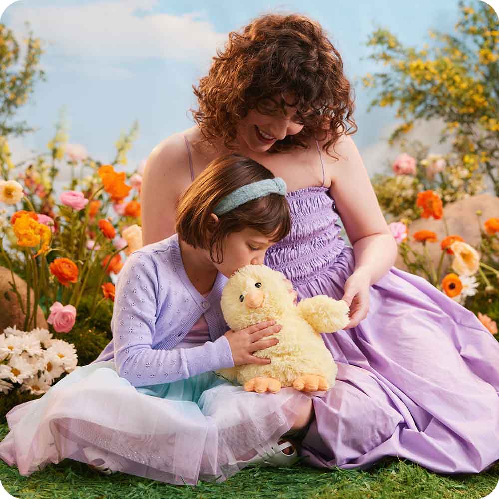 Mother and daughter cuddling cute Weighted Lavender Scented Chick Stuffed Animal Heating Pad Warmies