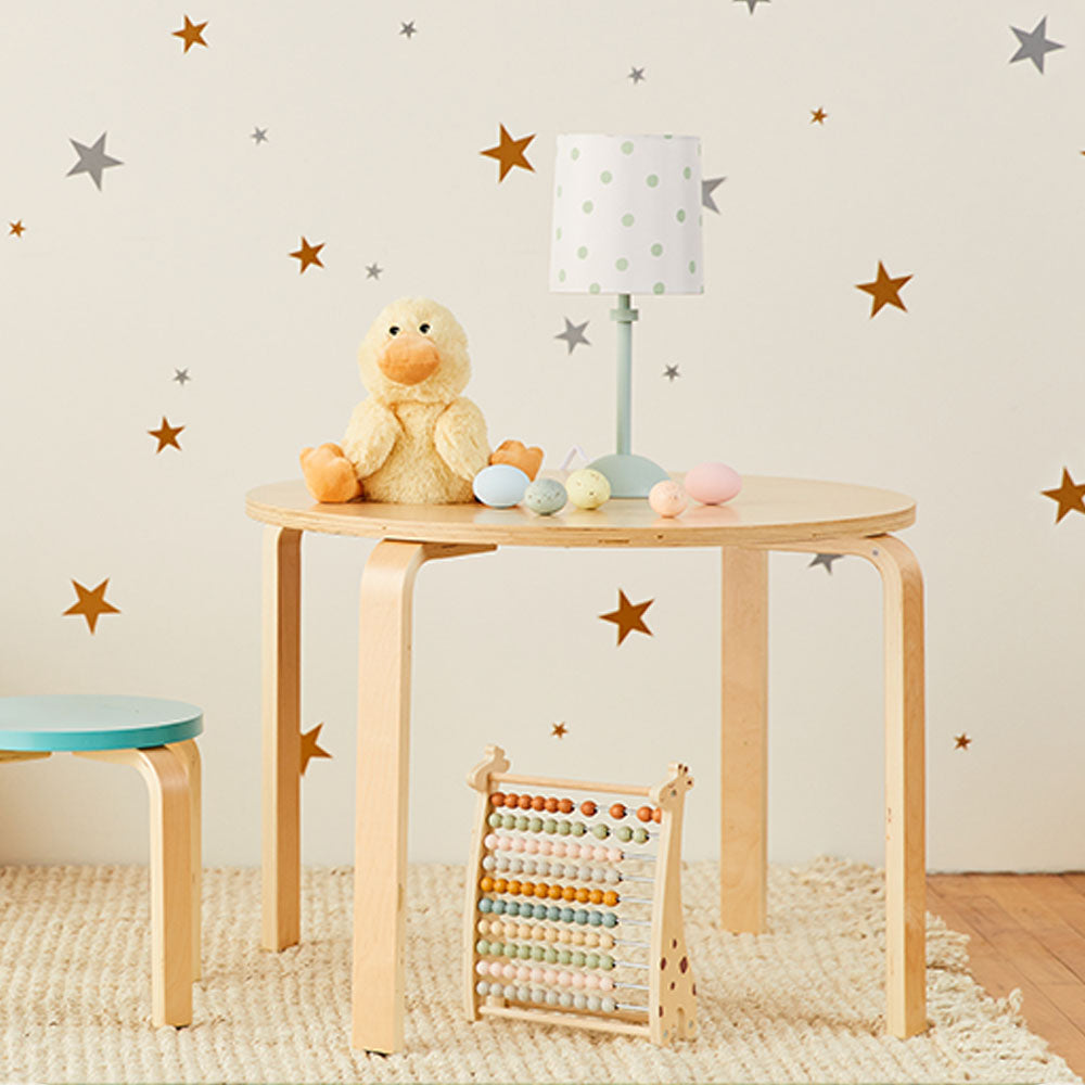 duck stuffed animal on table in kids room