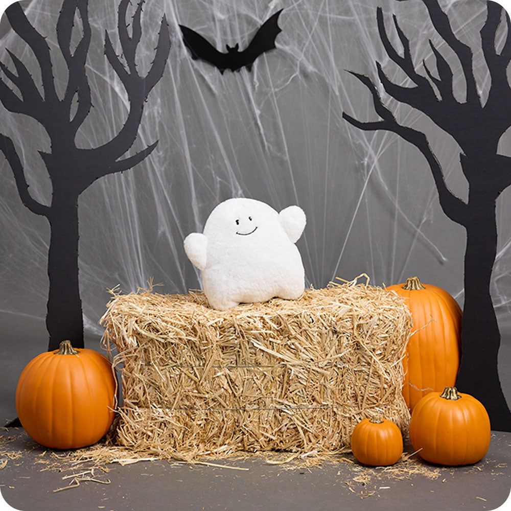 ghost stuffed animal warmies in halloween setting