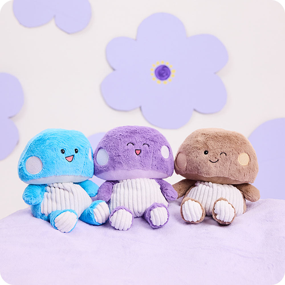 blue, purple, and brown mushroom trio stuffed animals