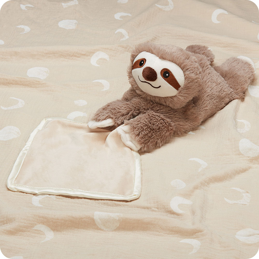 sloth blankie warmies on a blanket