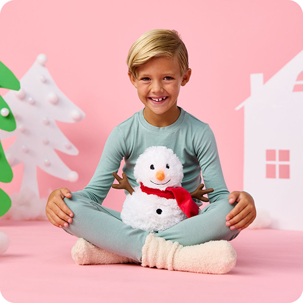 boy with warmies snowman stuffed animal
