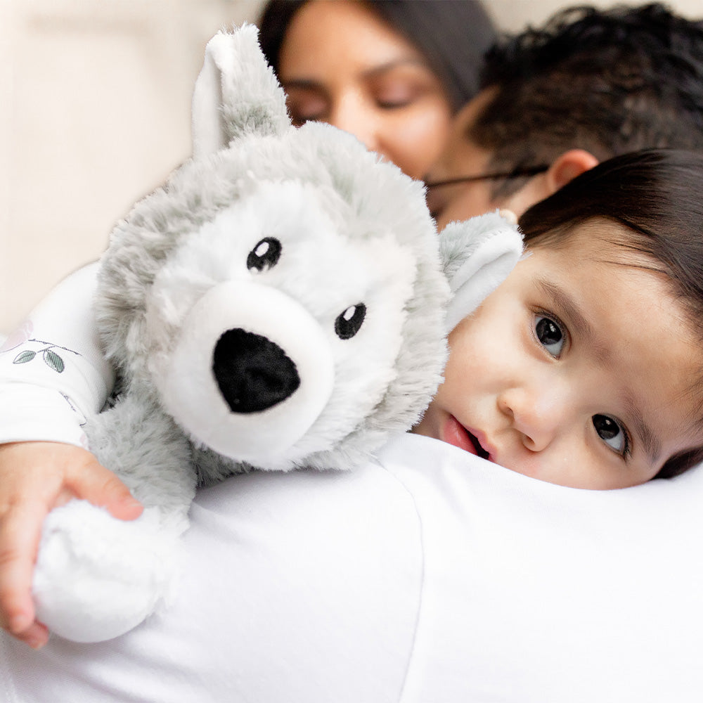 Parents and baby cuddling Soft Warm Weighted Husky Plush Warmies