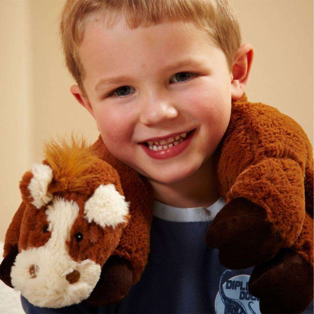 Little boy smiling while wearing Cute Soft Horse Wrap Stuffed Animal Warmies