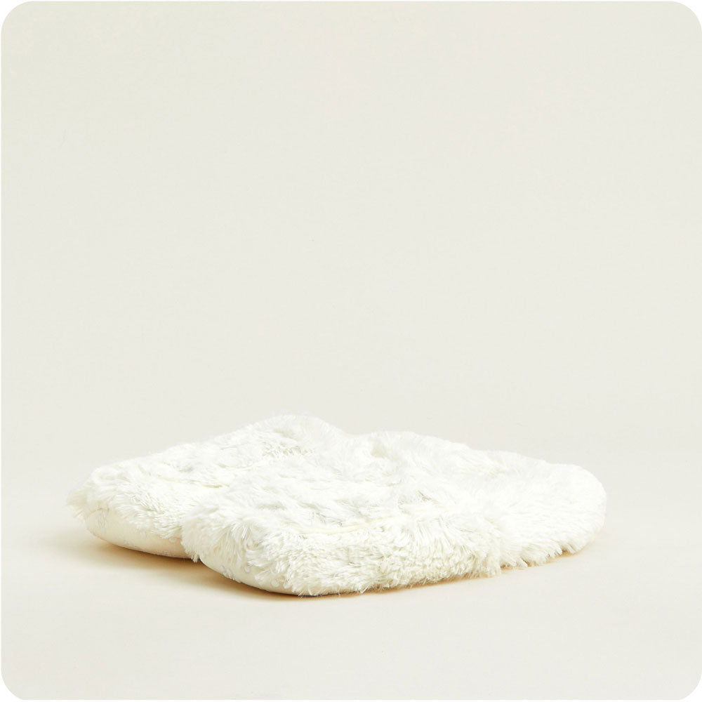Revitalize your feet with Cream Warmies Slippers—microwave and relax.