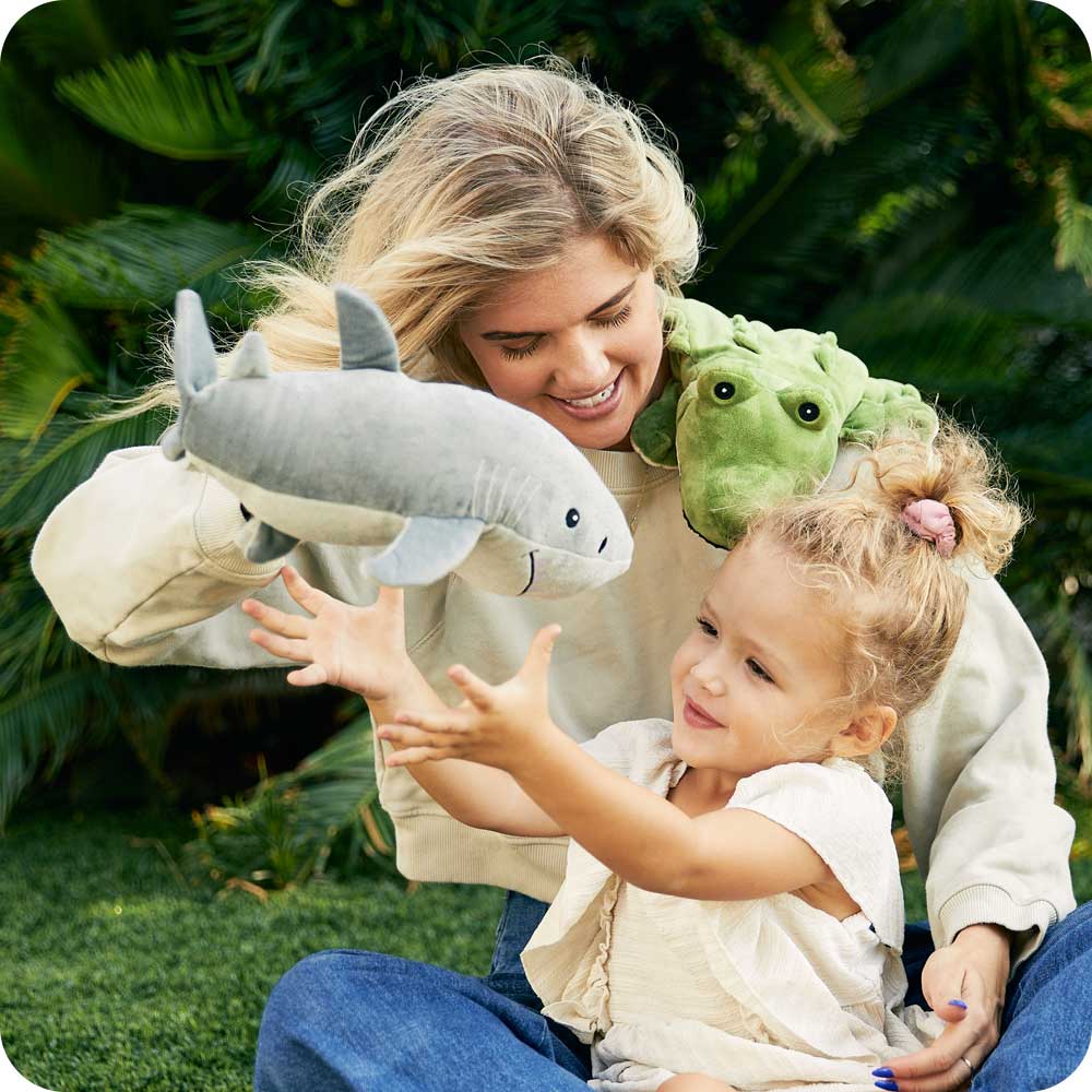 Mom and daughter playing with Cute Weighted Lavender Scented Shark Stuffed Animal Heating Pad Warmies