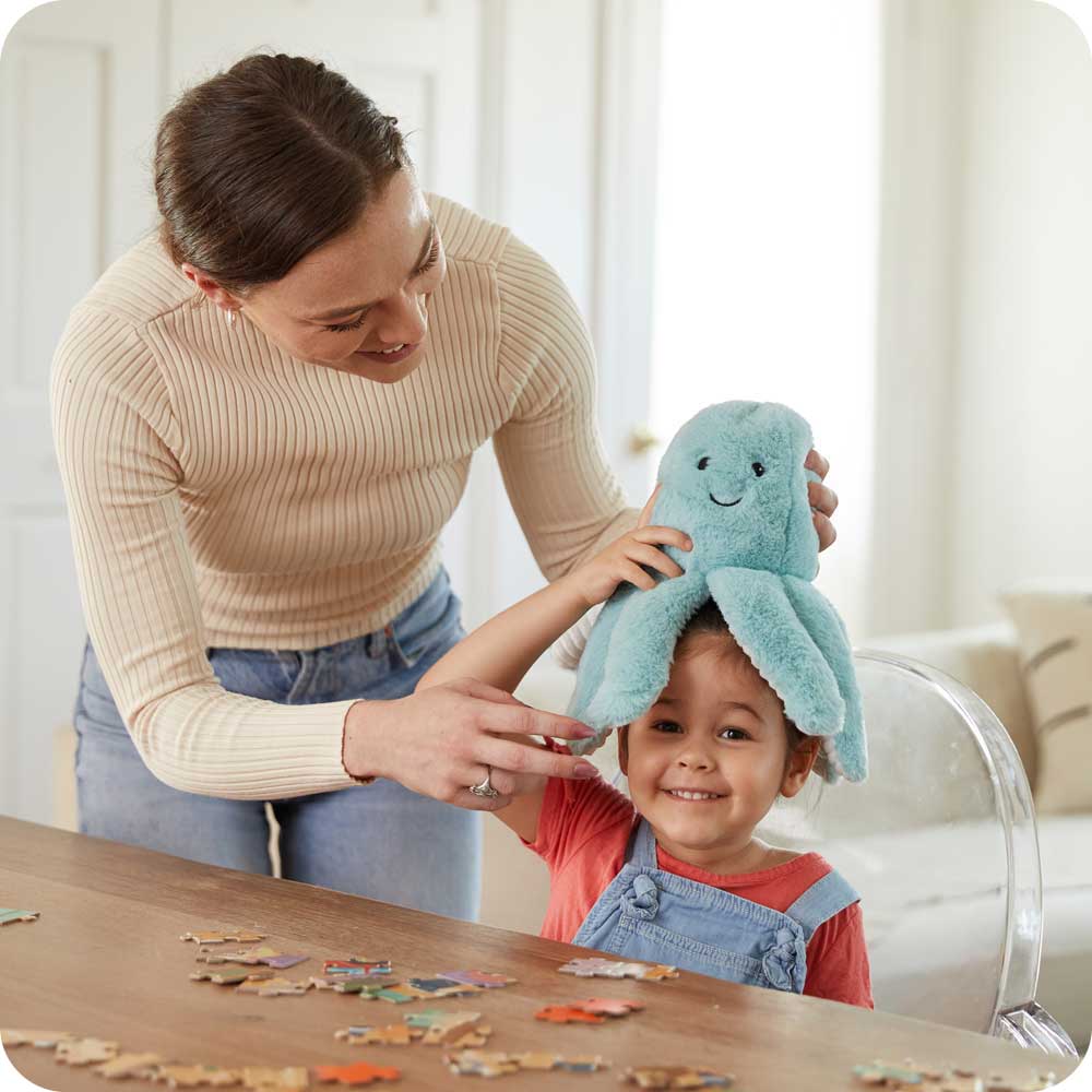 Mom and son playing with Cute Weighted Lavender Scented Octopus Stuffed Animal Heating Pad Warmies