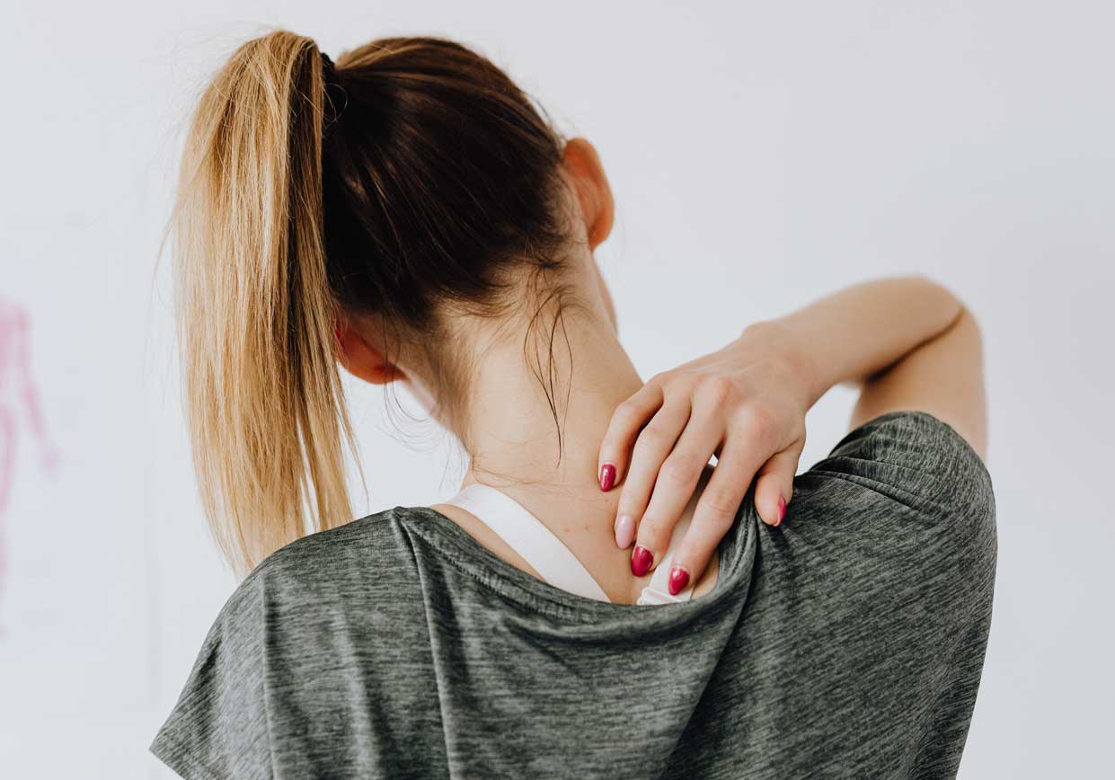 Back pain relief with Warmies wellness products.