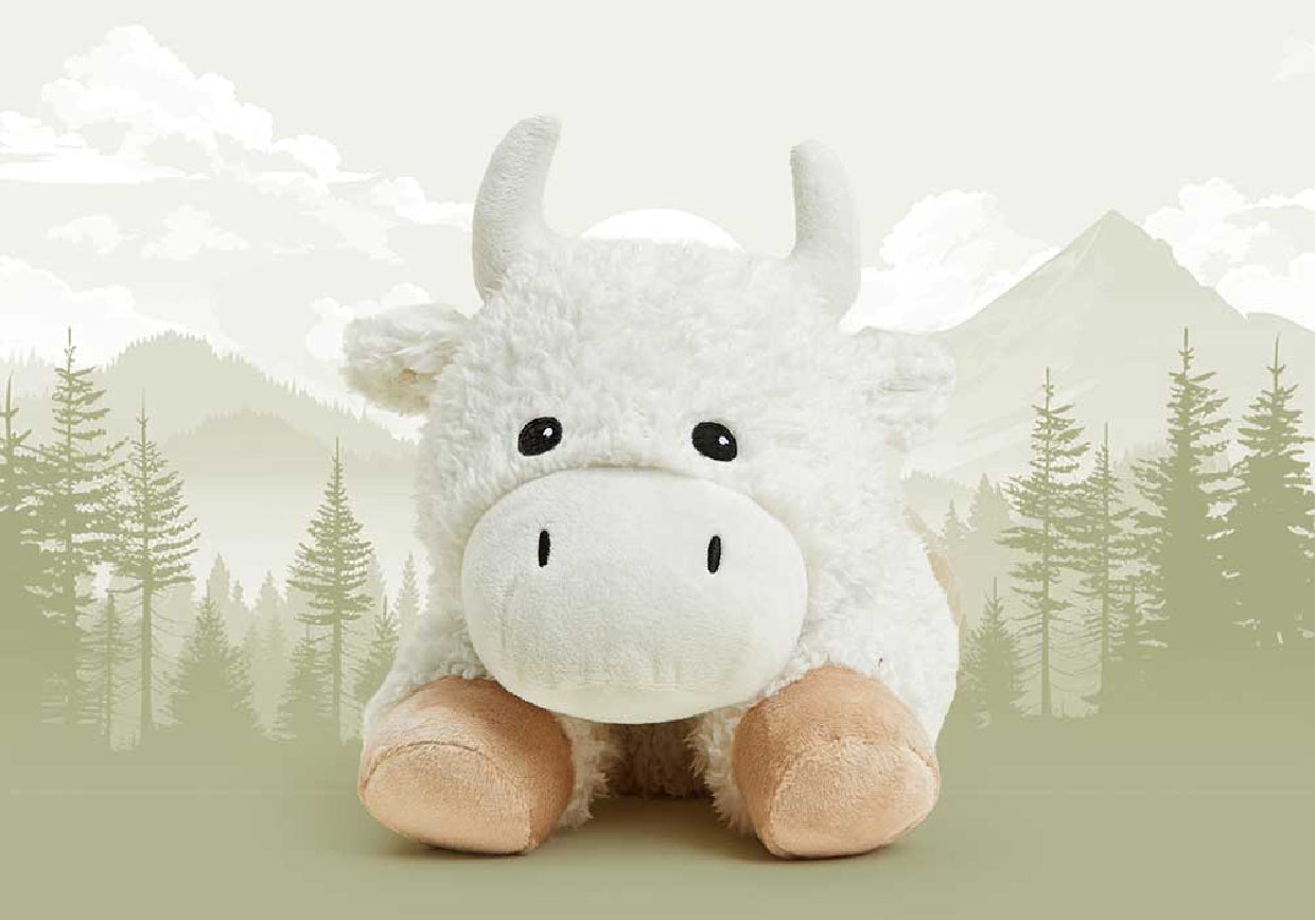 Buffalo Warmies on a green and white forrest background.