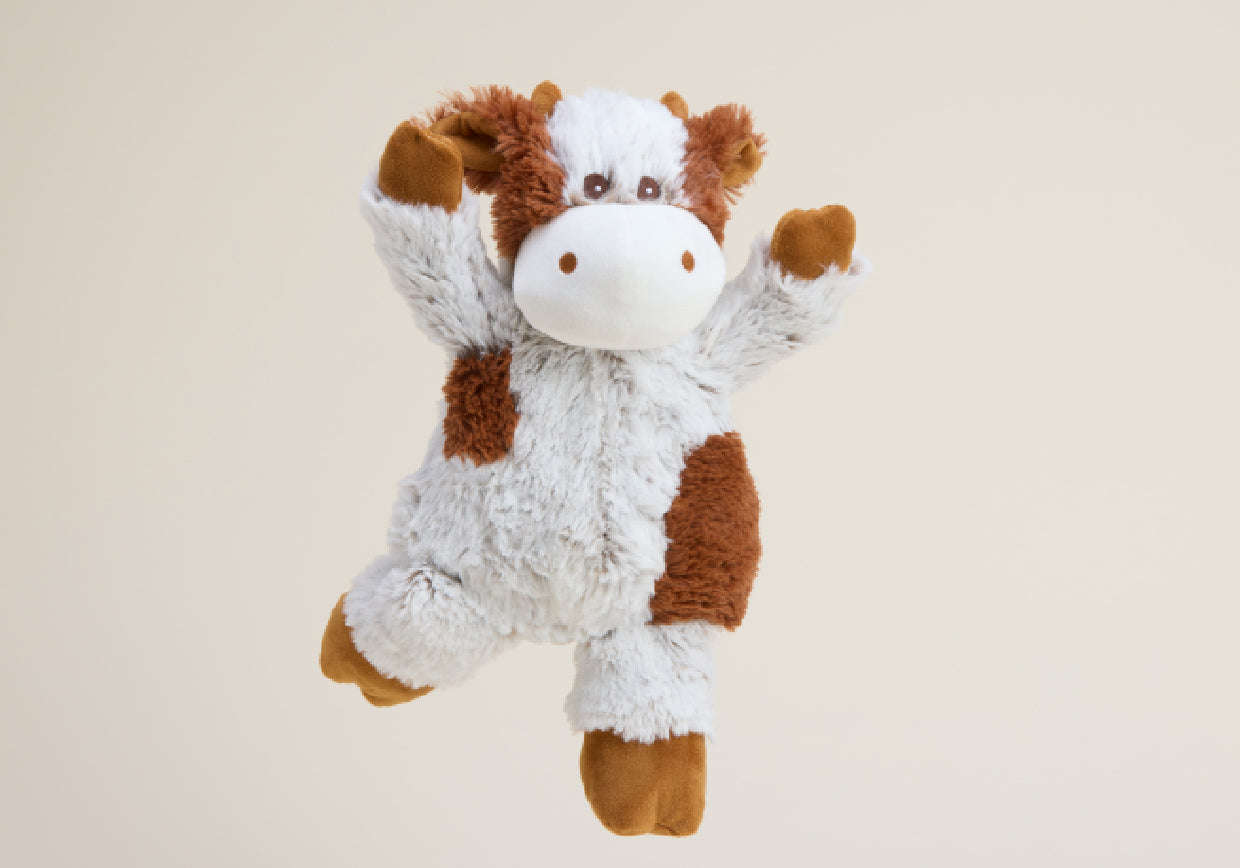 Orange and white Cinnamon Cow stuffed animal Warmies. 