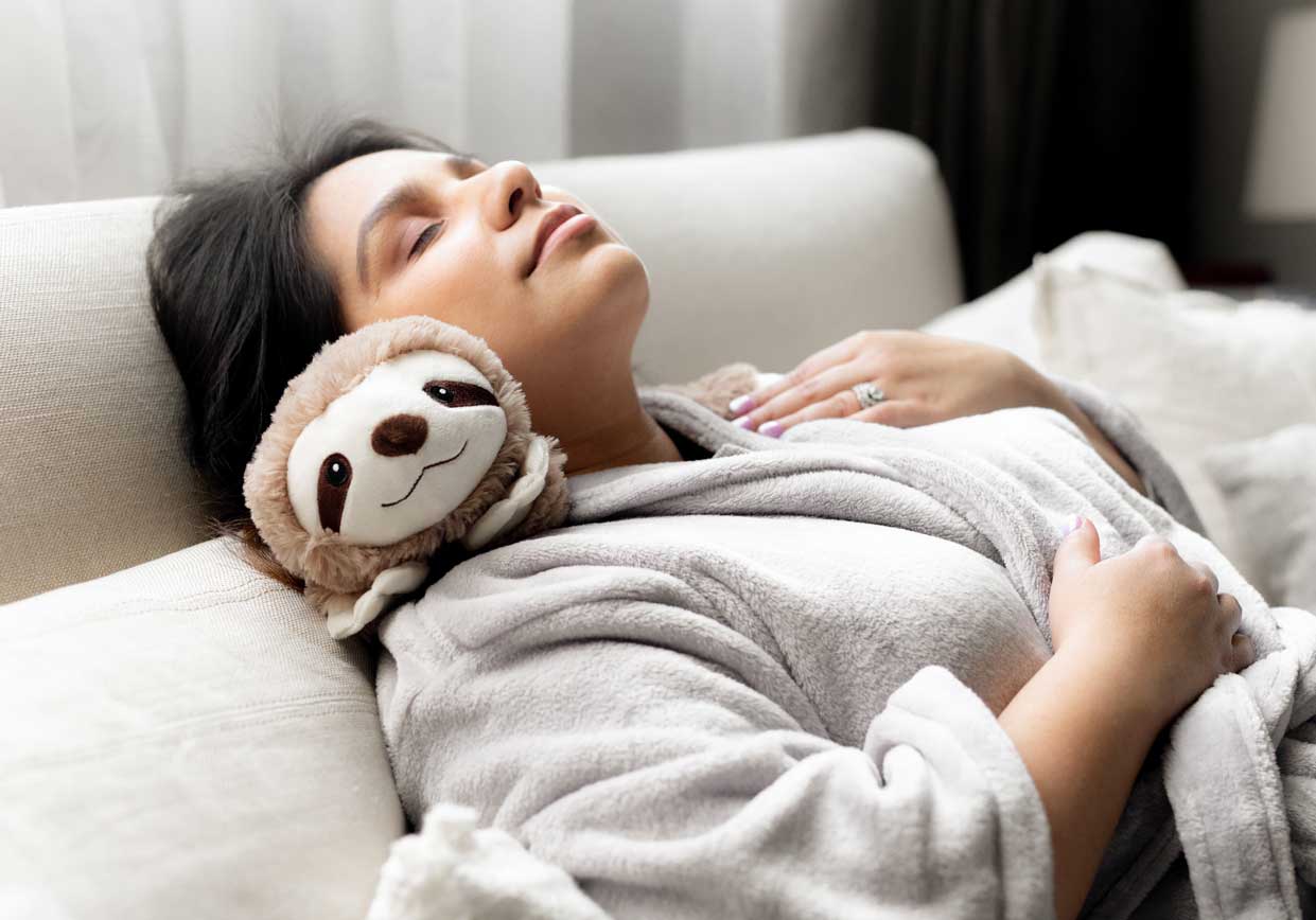 A Sloth Warmies providing soothing heated comfort.