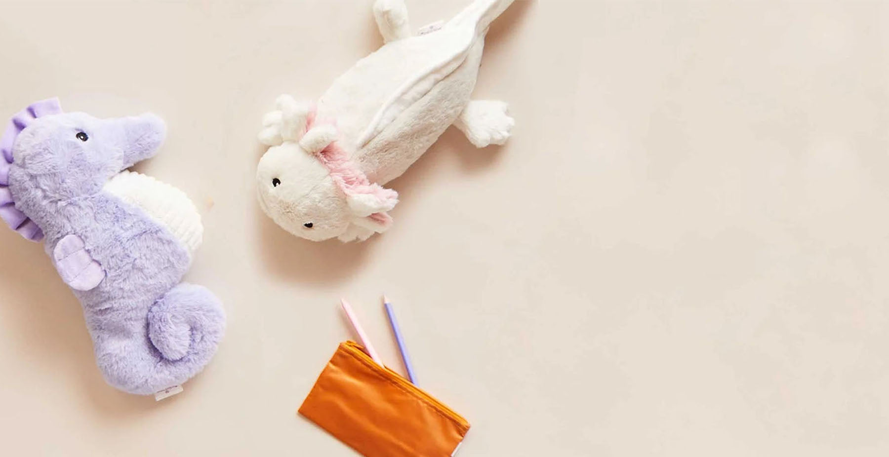 seahorse and axolotl stuffed animal warmies