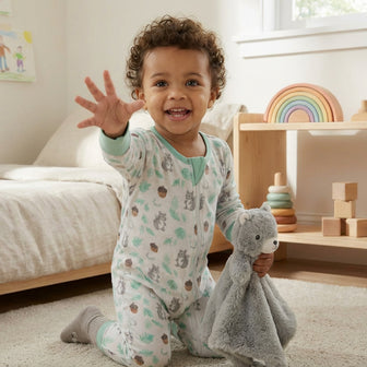Toddler Playing with Warmies Plush