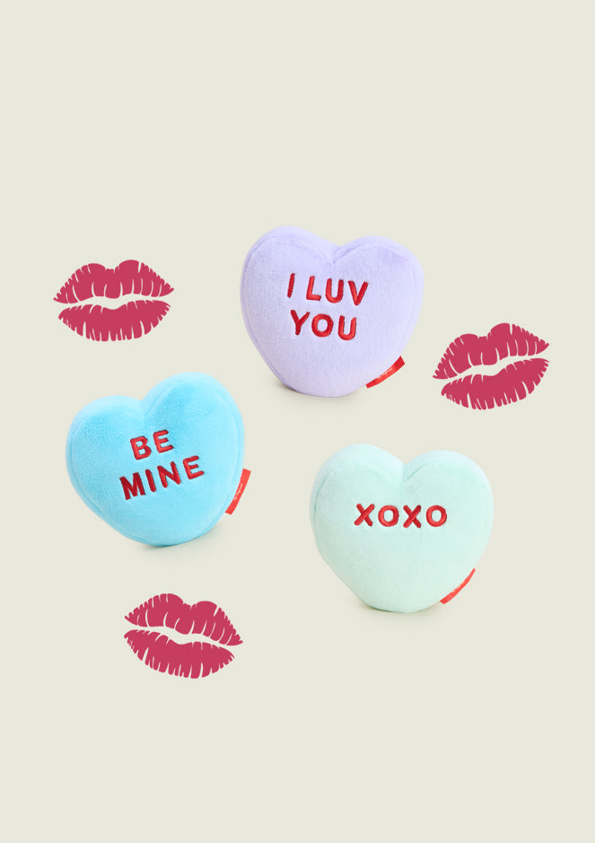 Sweetheart Warmies with printed text on a beige background with lipstick marks.
