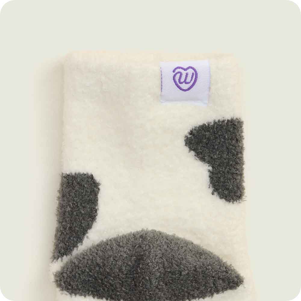 Warmies logo detail on Black and White Cow Crew Sock Set