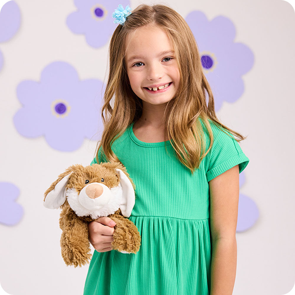 girl holding brown bunny warmies flower lifestyle