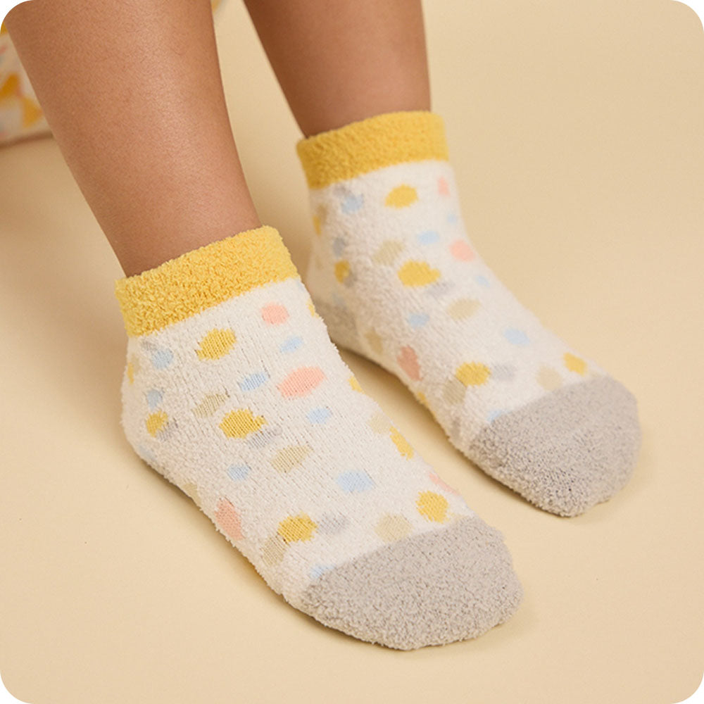 colorful calico cat socks on kids feet