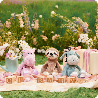 my first warmies trio pig, sloth, and donkey in garden picnic setting