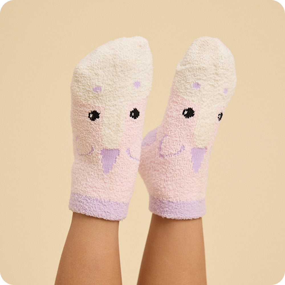 small unicorn socks on kids feet