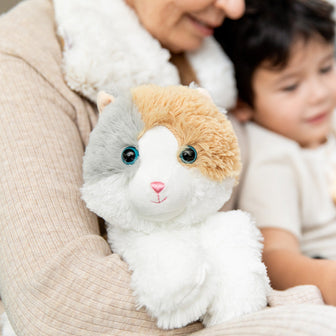 Grandma and child cuddling Soft Warm Weighted Calico Cat Plush Warmies