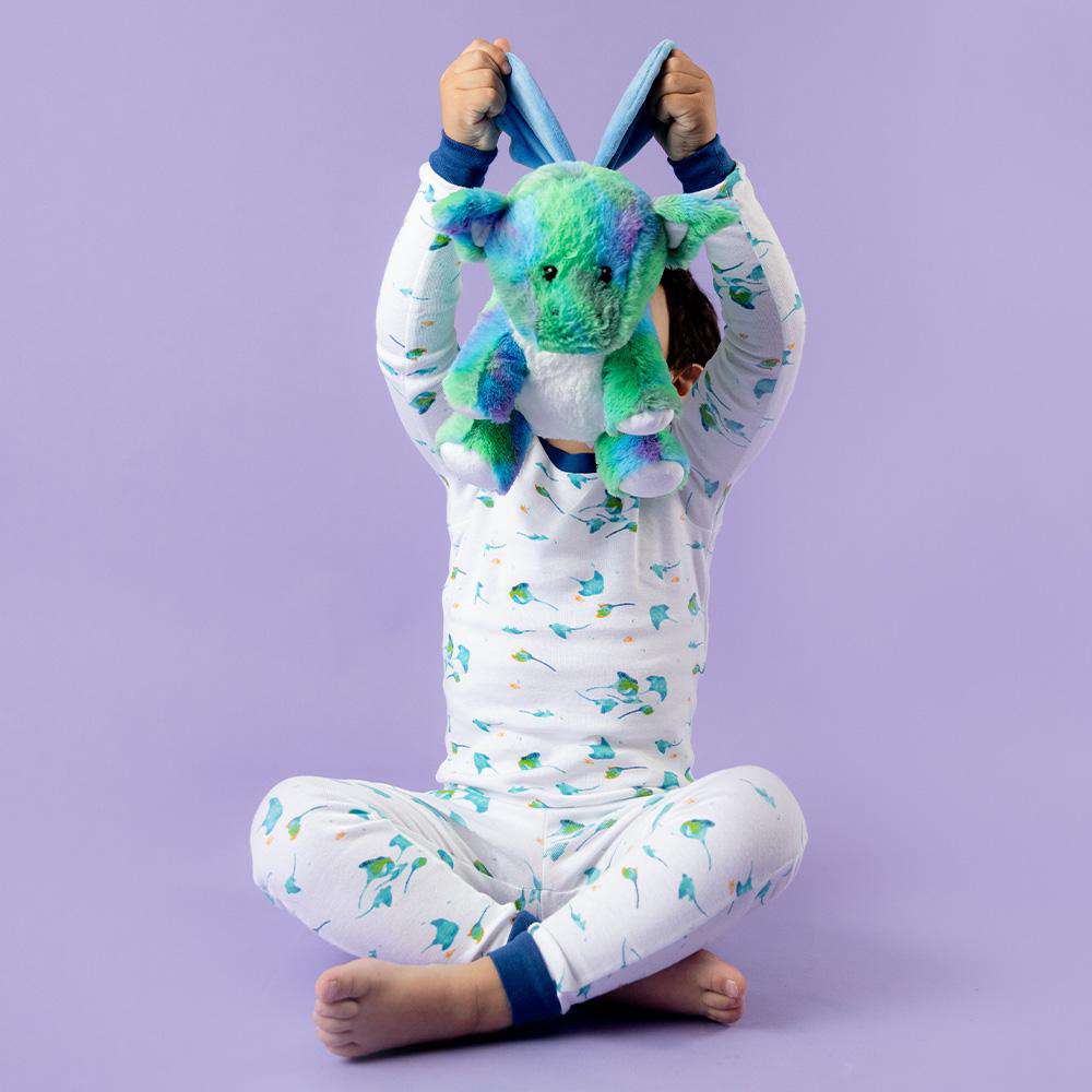 Little boy holding Microwavable Baby Dragon Warmies - Warmies USA