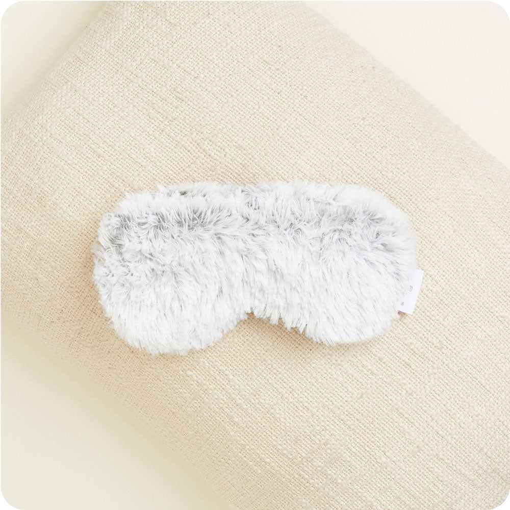 Indulge in relaxation with Warmies USA's Gray Marshmallow Eye Mask—microwave, soothe, repeat.	