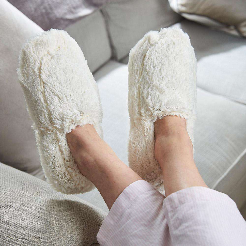 Cream Warmies Slippers: Pamper your feet with microwavable bliss.