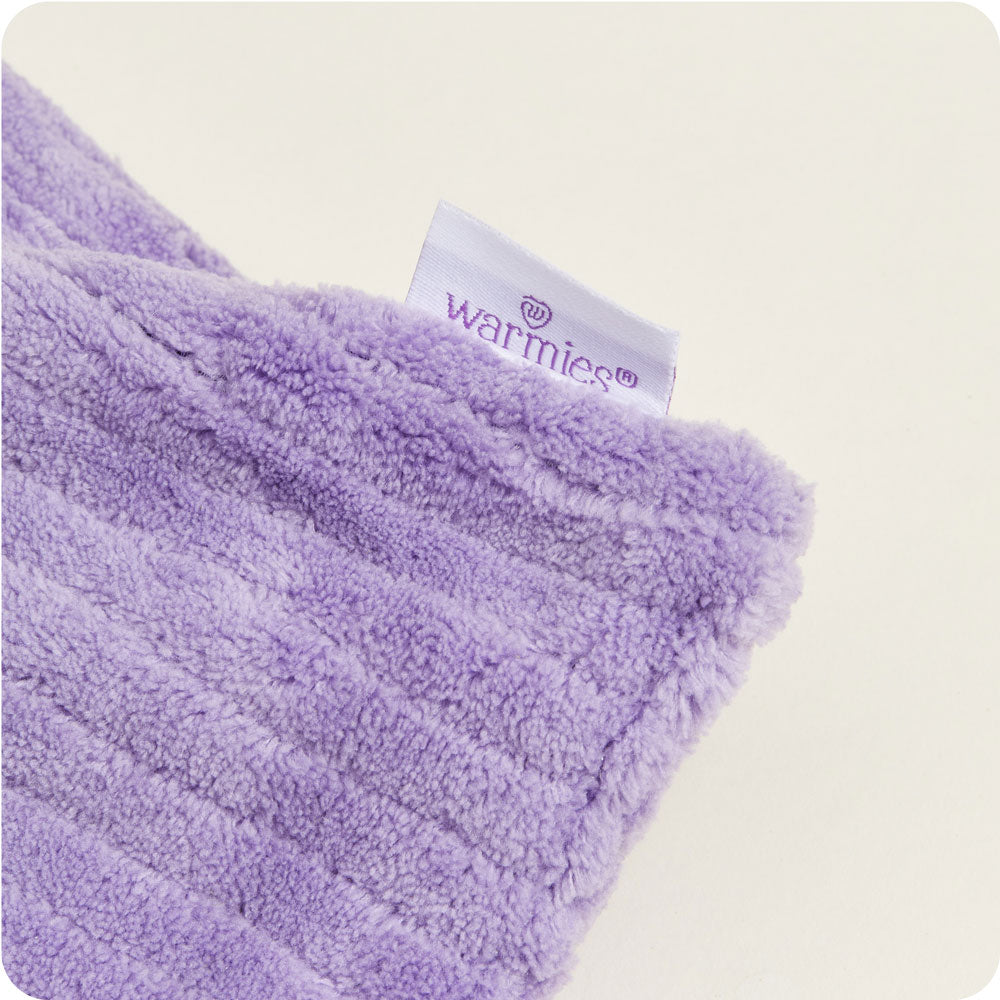 Revitalize with Warmies USA's Lavender Hot-Pak®—microwave, embrace, and unwind in luxury.		