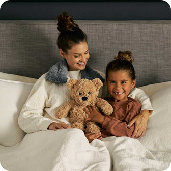 Mother and daughter cuddling while wearing Soft Cozy Heatable Gray Warmies Neck Wrap