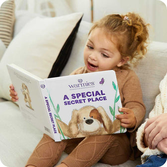 Little girl reading A Special Secret Place Board Book - Warmies USA